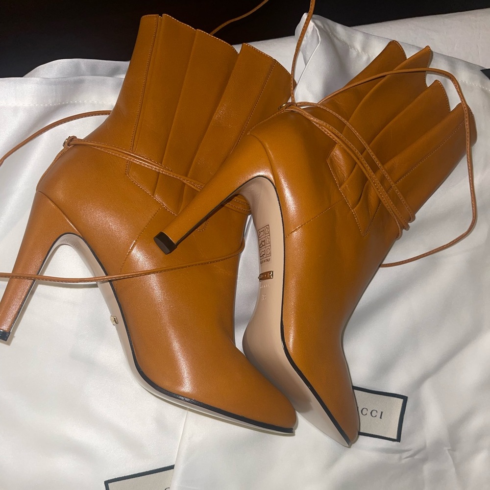 New Gucci boots never worn